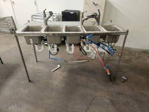 lot 104 image: Stainless steel 5 bowl sink workstation