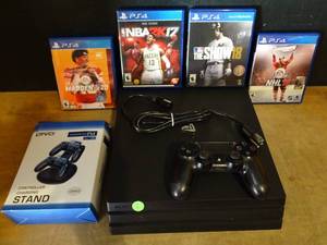 lot 2 image: BIG $ LOT - PlayStation 4 Slim Black w 1 Controller, Controller Charging Stand, and 4 Games including Madden NFL 20