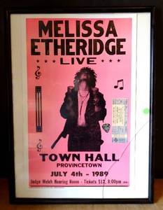 lot 15 image: ORIGINAL MELISSA ETHRIDGE CONCERT POSTER WITH TICKET STUB AND BAND PICK - FRAMED UNDER GLASS (CRACK) MEASURES 18 X 24
