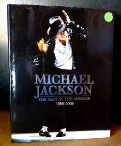lot 60 image: King Of Pop Michael Jackson The Man in the Mirror 1958-2009 Hardcover Book