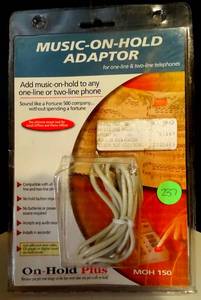 lot 237 image: NEWSEALED - MOH 150 MUSIC ON HOLD ADAPTER