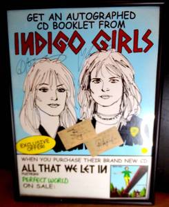 lot 14 image: AUTHENTIC AUTOGRAPHED POSTER WITH SIGNED TICKET STUBS - INDIGO GIRLS ALL THAT WE LET IN (2004) BASS PERFORMANCE HALL - FRAMED UNDER GLASS 18 X 24