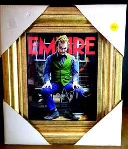 lot 284 image: AUTHENTIC AUTOGRAPH - 11 X 14 FRAMED UNDER GLASS - AMAZING HEATH LEDGER AS THE JOKER IN EMPIRE