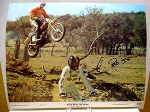 lot 327 image: RARE VINTAGE AUTOGRAPHED MOVIE LOBBY CARD 11 X 14 - 1975 RACE WITH THE DEVIL HAND SIGNED BY LEGENDARY PETER FONDA $$$