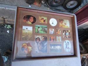 lot 181 image: Burnes of boston picture frame new, holds 15 small pictures  16 X 20