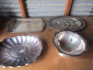 lot 85 image: Reed&Barton silver soldered bowl #1110 size 410--- Footed Wm. Rogers platter #3610 size 18--- Reed&Barton # 110 size 15 platter---- Mappin& Webb LTD platter size 17 qty 4 pieces