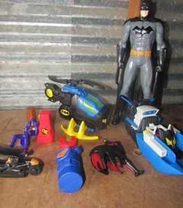 lot 88 image: Batman toy lot includes, 13 batman figurine, batman helicopter, bat motorcycle and more