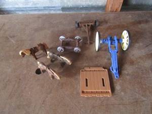 lot 92 image: Small lot of horses and pull along trailesr