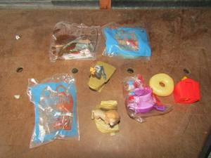 lot 101 image: Various Mc Donalds toys new and use, scooby doo, lion king, Donald duck