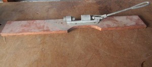 lot 124 image: Reeds Rocket pecan cracker 30 inches long used in good condition just needs to be cleaned