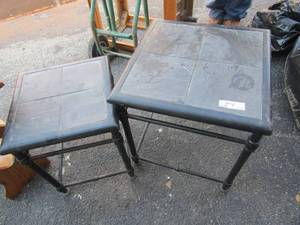 lot 135 image: Black stone patio tables qty 2 sizes are- 161414--- 201818