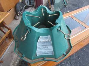 lot 145 image: 1.9 gallon 9ft tree stand green in color