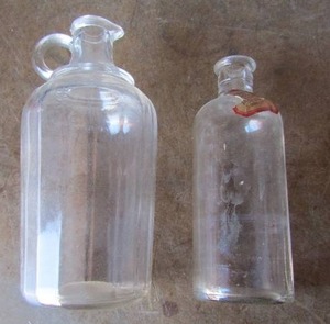 lot 166 image: 2 vintage wood alcohol poison bottles empty