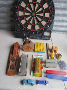 lot 197 image: Digital dart board with score keeper, various kids vintage toys trains, grey hound bus and more