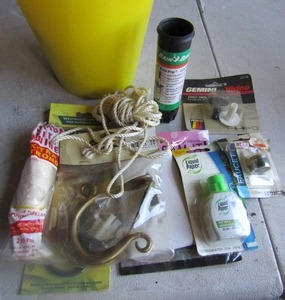 lot 201 image: Misc. lot of water faucets, faucet lug, kite twine hooks and more
