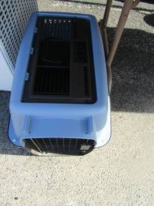 lot 12 image: Bran new blue and black dog cat crate, smaller animals