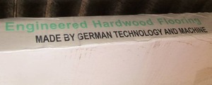 lot 23 image: Hardwood flooring large  Box New, only description is # is09001 is014001
