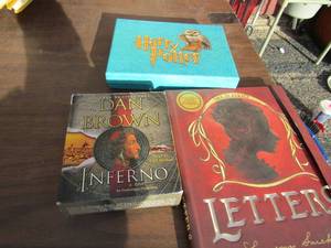 lot 71 image: Harry potter stationary set NIB, Dan Brown compact disk set,  The Beatrice letters book game