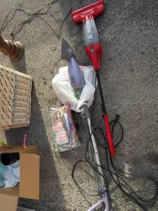 lot 77 image: Shark floor cleaner with extra floor pads, used bottle of chemicals and more, works good