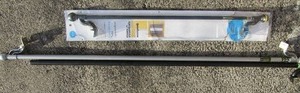 lot 81 image: 3 new curtain rods, black, silver