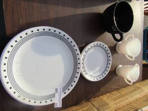 lot 83 image: Sugar & creamer milk glass, Black handled soup cup, Carrell saucers and plates with black lines and dots around edge