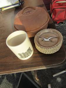 lot 86 image: Boot pattern cup, 4 glass western coasters, clay tortilla warmer has the lid as well