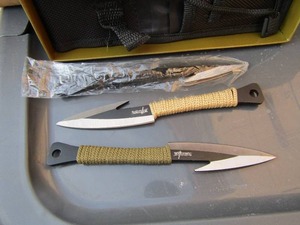 lot 89 image: NEW Survivor throwing knife set qty 3 in pack with sharpening stone, comes in case