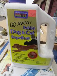 lot 97 image: Lucky dog sign, used tub of rabbit and cat repellant, doggy blow dryer