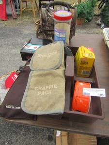 lot 105 image: battery charger, crappy pack, turtle wax and a camo lunch box