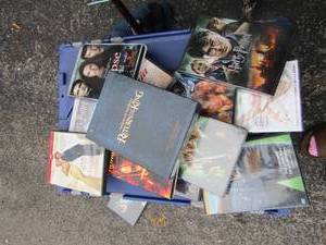 lot 133 image: DVD movie lot, The lord of rings set new, lots of Harry Potter movies various ones, The sisterhood of traveling pants