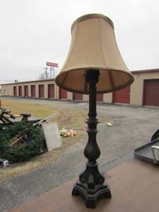 lot 134 image: Small Black lamp with light brown shade, works