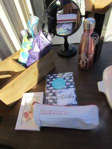 lot 142 image: New champagne color tumbler with Ellie wrote on it, make up mirror, various umbrellas and more