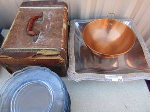 lot 150 image: 12 clear glass saucers, small suitcase of kitchen utensils, one handled copper bowl and a silver platted square fruit bowl