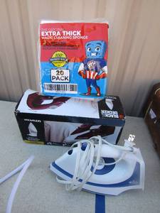 lot 151 image: new in box black and decker iron, 6 prong extension cord,  a rival iron and a new pack of the original extra thick cleaning sponges 20 pack