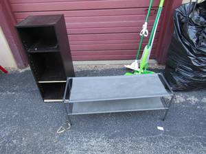 lot 177 image: 2 tier black wooden book shelf, 2 tier fabric shoe rack used, needs to be straightened