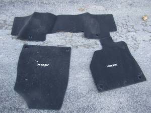 lot 180 image: MDX floor mats new qty 3, unknown use for what type of vehicle