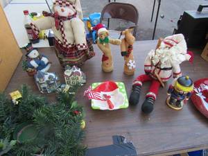 lot 182 image: Household Christmas dcor lot, includes table center piece, stand able snowmen and Santa, serving platter, butter dish with spreader and more