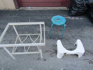 lot 186 image: Metal outdoor table with no top, easy fix-- 202518, small green plant stand, white around the commode foot step for kids
