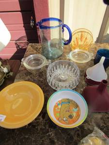 lot 218 image: Blue handled glass water picture, various kitchen funnels and bowls. Yellow glass napkin holder