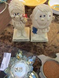 lot 219 image: Crystal ring holder, Texas shape coaster, worlds best father, and Happy birthday statues qty 2