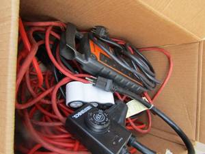 lot 233 image: Box of various size extention cords some have multiple outlets