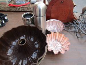 lot 235 image: kitchen lot, 2 different size bunt pans, jello molds, and 2 tumblers and a thermis