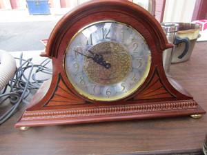 lot 237 image: Howard Miller millennium edition clock in good condition