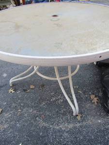 lot 243 image: 2 off white outdoor patio chairs in good condition and a white glass top patio table 26 x 48 could use a little talc