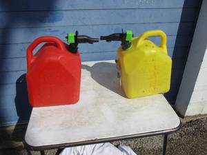 lot 18 image: 2-5 Gallon-Scepter Smart Control Plastic Fuel Cans, 1-Red-Gas And 1-Yellow-Diesel