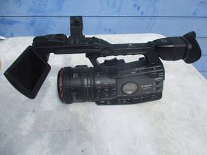 lot 67 image: NON-WORKING- Canon XF305 Professional Camcorder. Can Not Get It To Power On. No Battery Included. It was tested with a good battery.