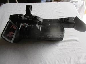 lot 68 image: NON-WORKING- Canon XF305 Professional Camcorder. Can NOT Get It To Power On. No Battery Included, It was tested with a good battery.