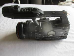 lot 69 image: NON-WORKING- Canon XF305 Professional Camcorder. Can NOT Get It To Power On. No battery Included. It was tested with a good battery.