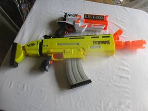 lot 70 image: Lot-Battery Powered Nerf Fortnite Rifle With 10- Foam Darts In Clip -Works- And Ultra Battery Powered Pistol, Needs Batteries