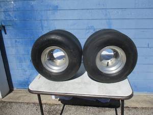 lot 100 image: 2- Green Master, Nylon 18 x 9.50-8 Smooth Tubeless Tires And 5 Lug Wheels